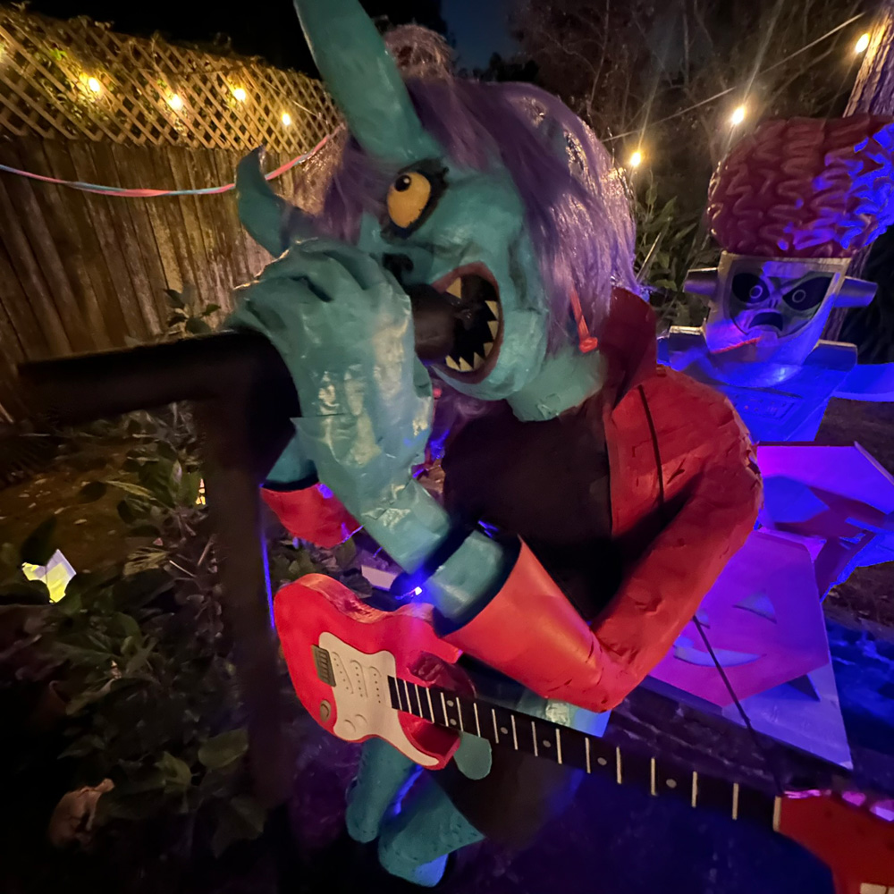 Another shot of the demon singer lady in more normal light at nighttime