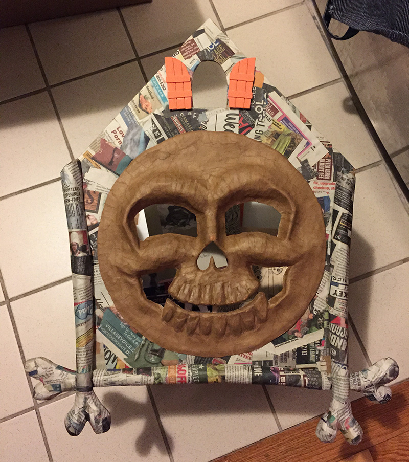 paper mach&eacute; cuckoo clock skull mask