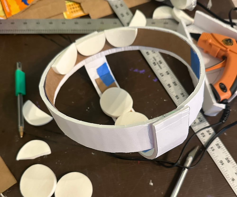 Headband of foam board with makeup pads
