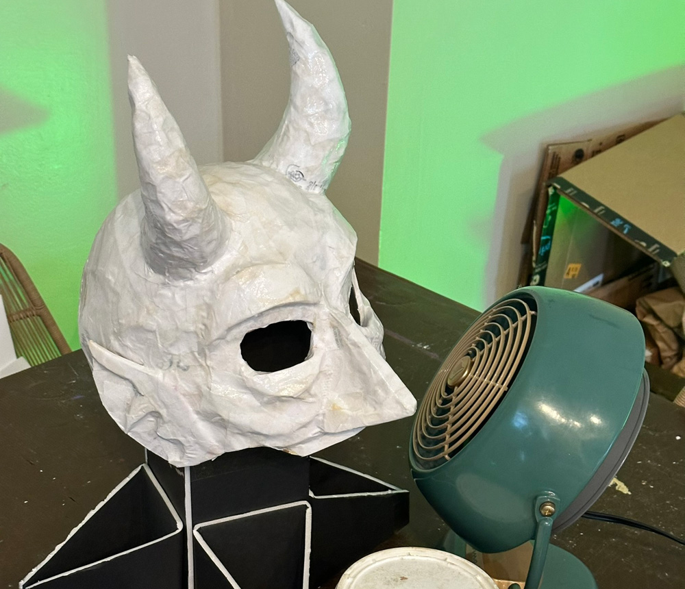 The whole mask is now covered in white paper.
