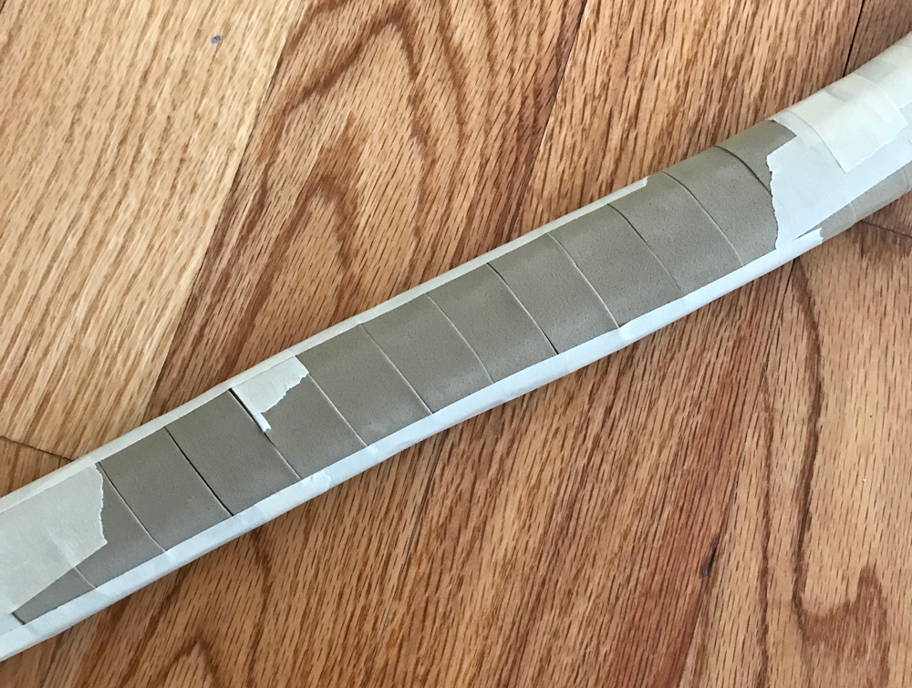 wrapping craft foam onto handle