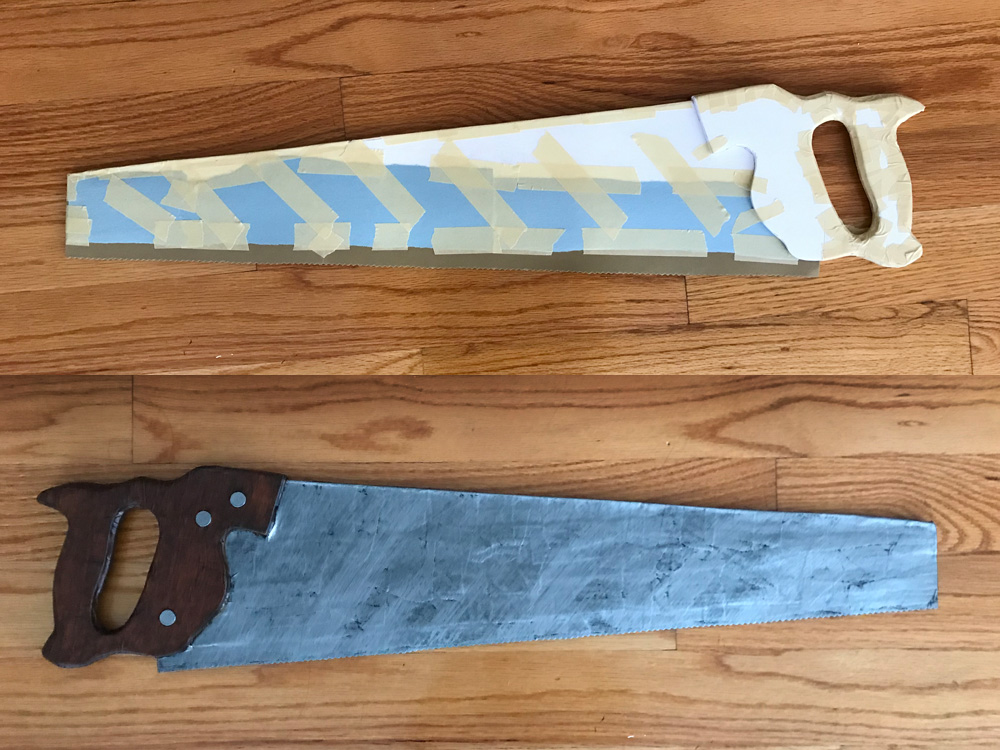 Paper mache hand saw prop