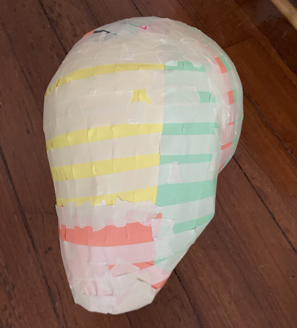 Pro wrestler skeleton costume - construction paper strips