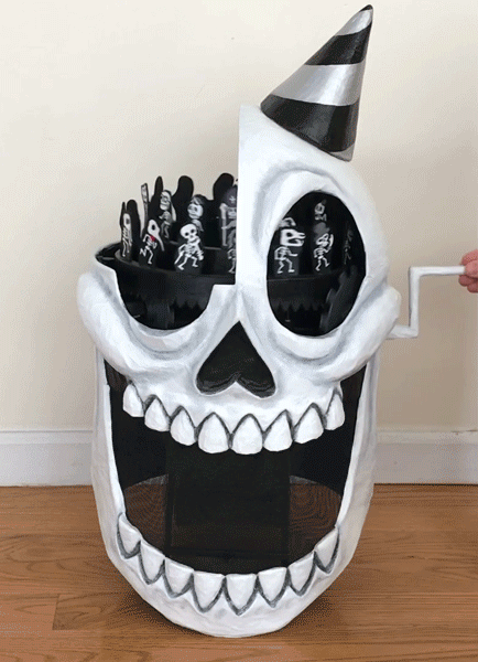 Skull mask with gears and rotating rings