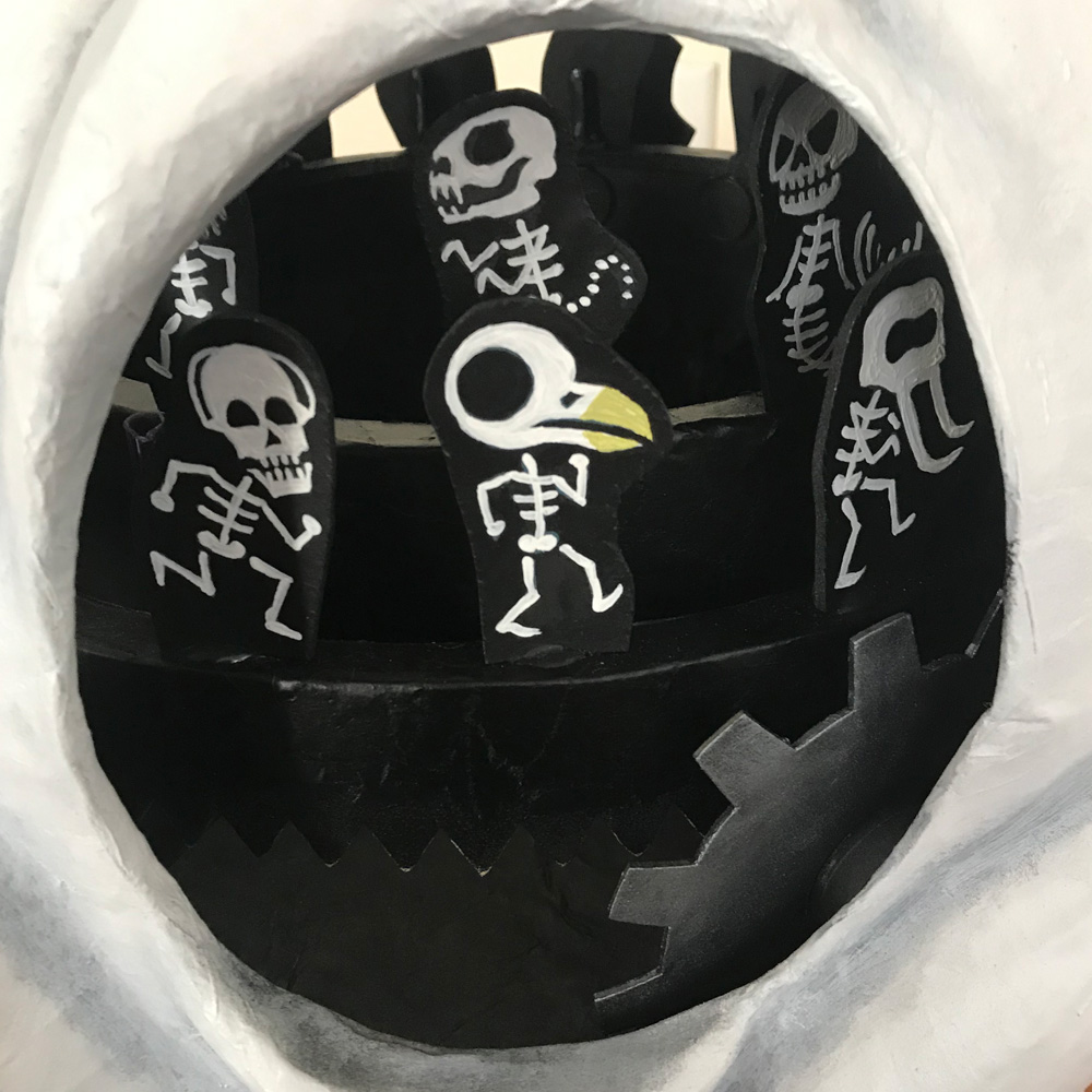 Animated skull mask - marching skeletons through eye hole