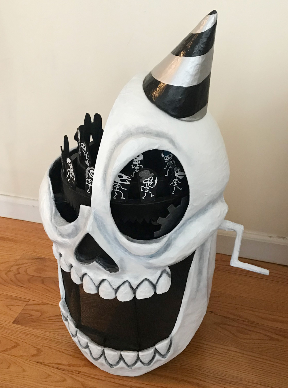 Skull mask with gears and marching skeleton