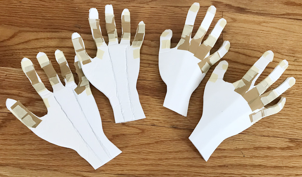 Spider costume -- bending and taping knuckles