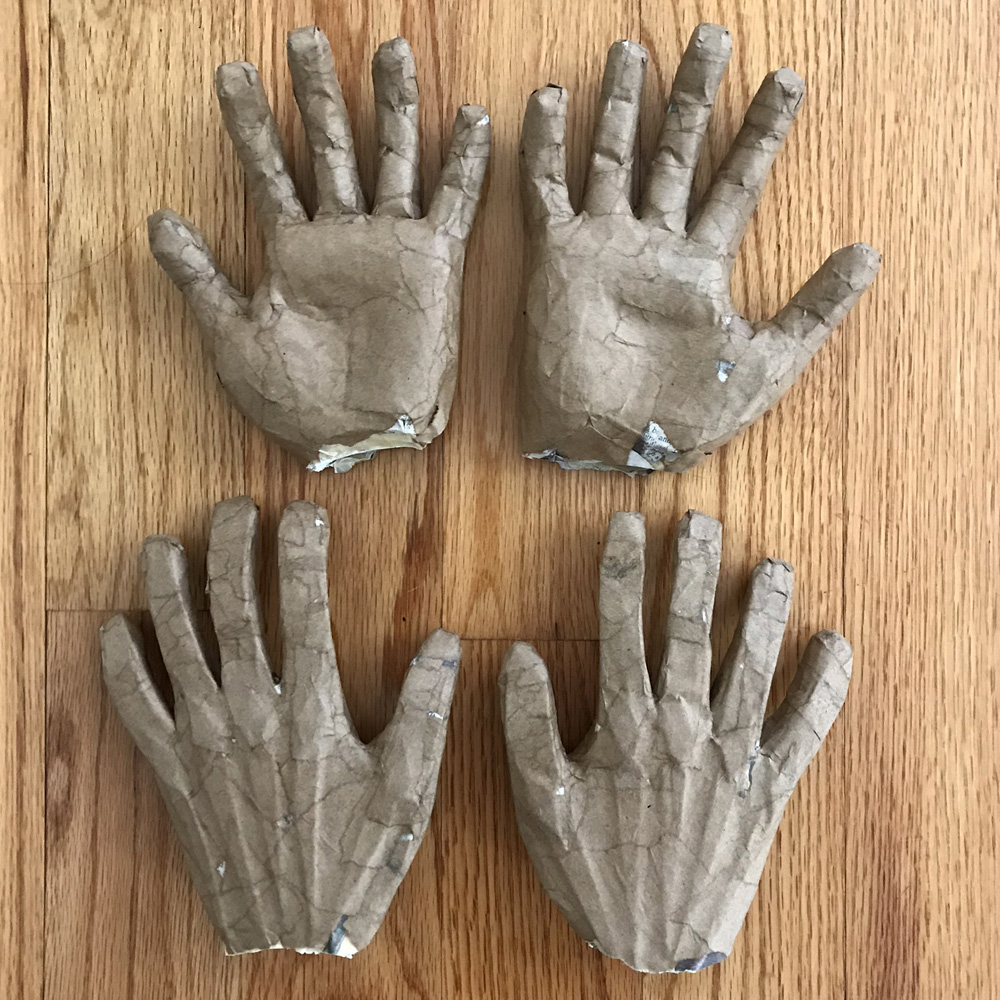 Spider costume -- paper mach&eacute; on hand shapes