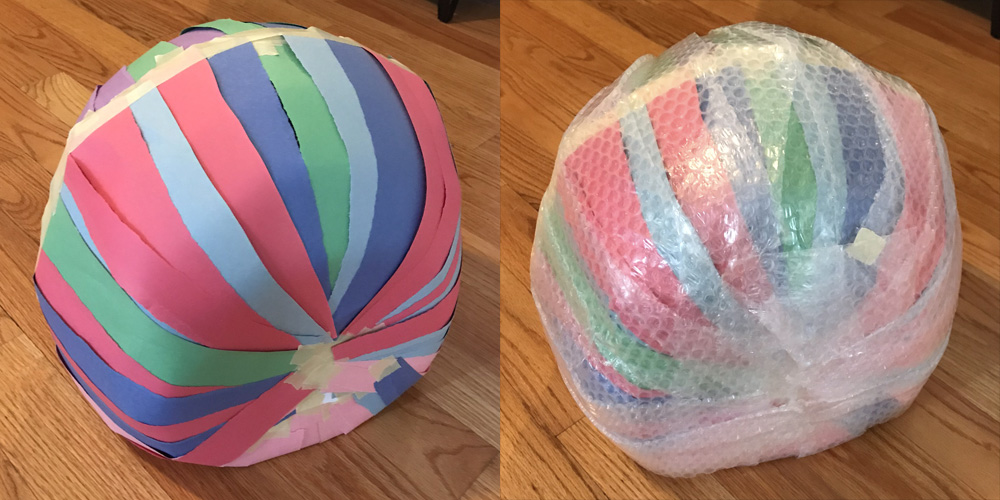 Paper mach&eacute; spider skull mask -- paper strips, bubble wrap