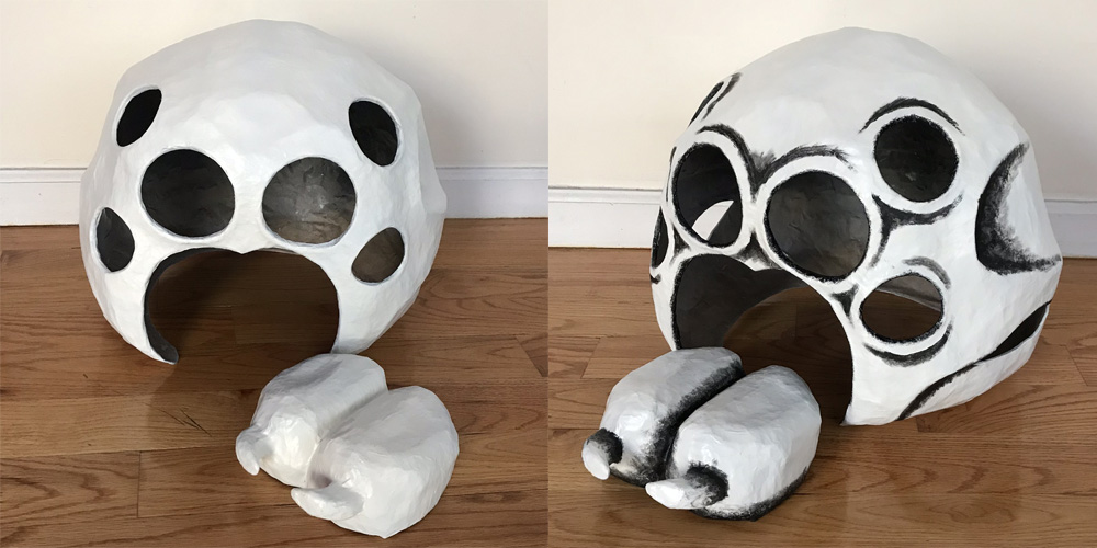 Paper mach&eacute; spider skull mask - white spray paint, black shadows