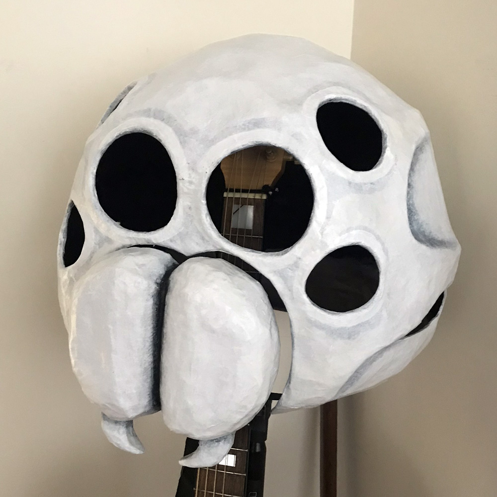 Paper mach&eacute; spider skull mask - attaching the fangs