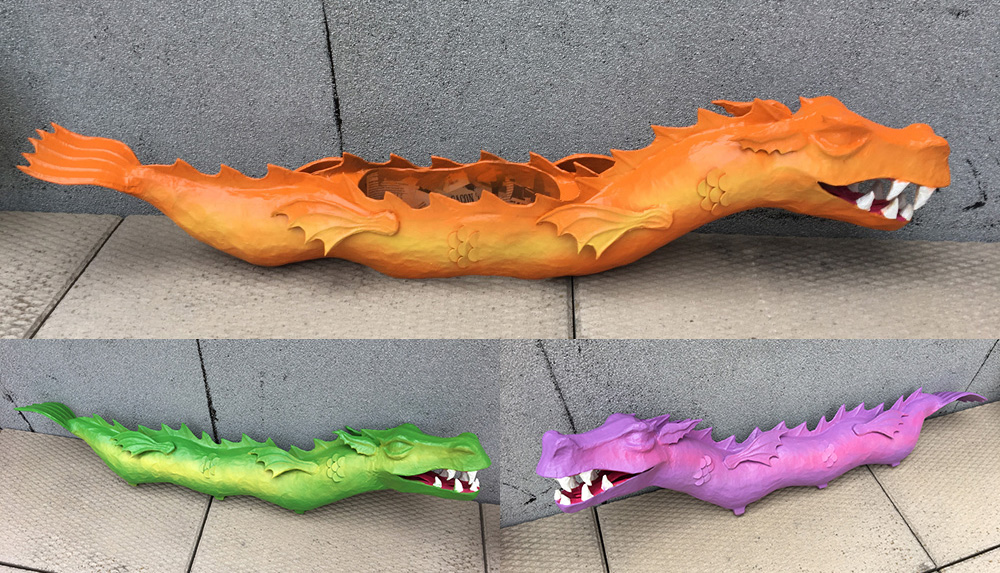 Paper mache three-headed dragon - spraypainting the bodies