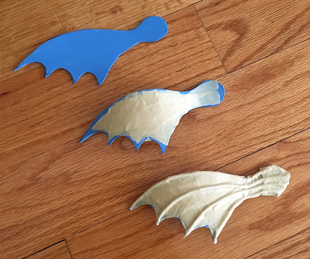 Paper mache sea serpent - making the fins