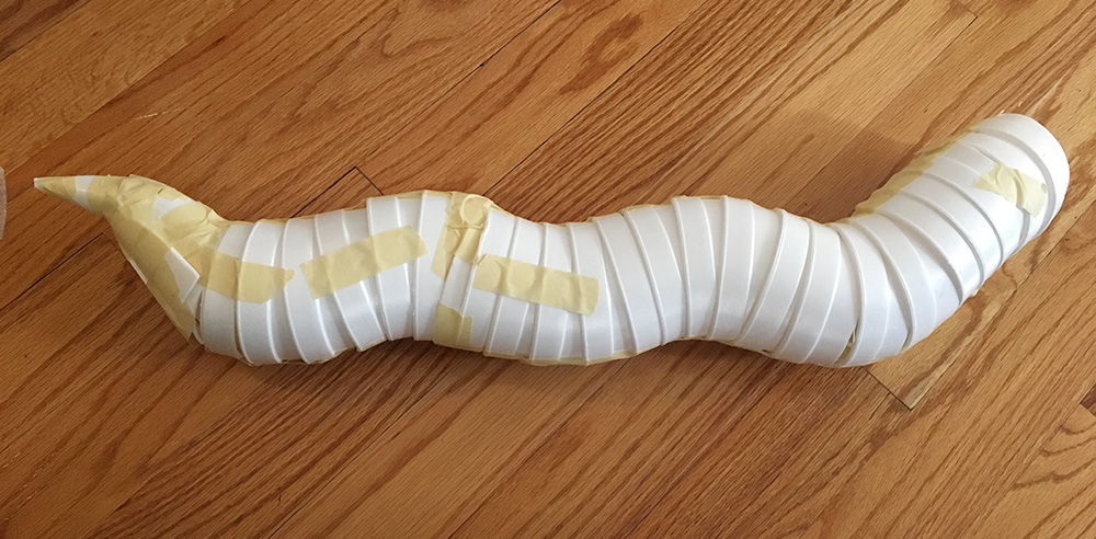 Papier mach&eacute; dragon sculpture - styrofoam cups to round out the body
